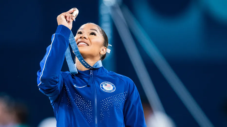 USA gymnast Jordan Chiles holding her bronze medal at the 2024 Olympics (Elle)