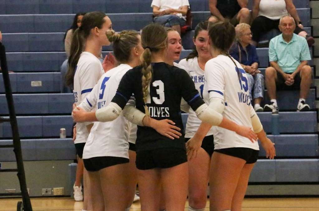 Bailey (#13) and Varsity Vollyeball team during their game against Westerville North on September 12th