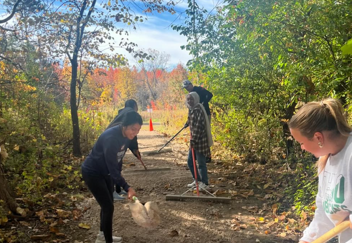 Interact Members participating in Community Trash Cleanup outside of school hours