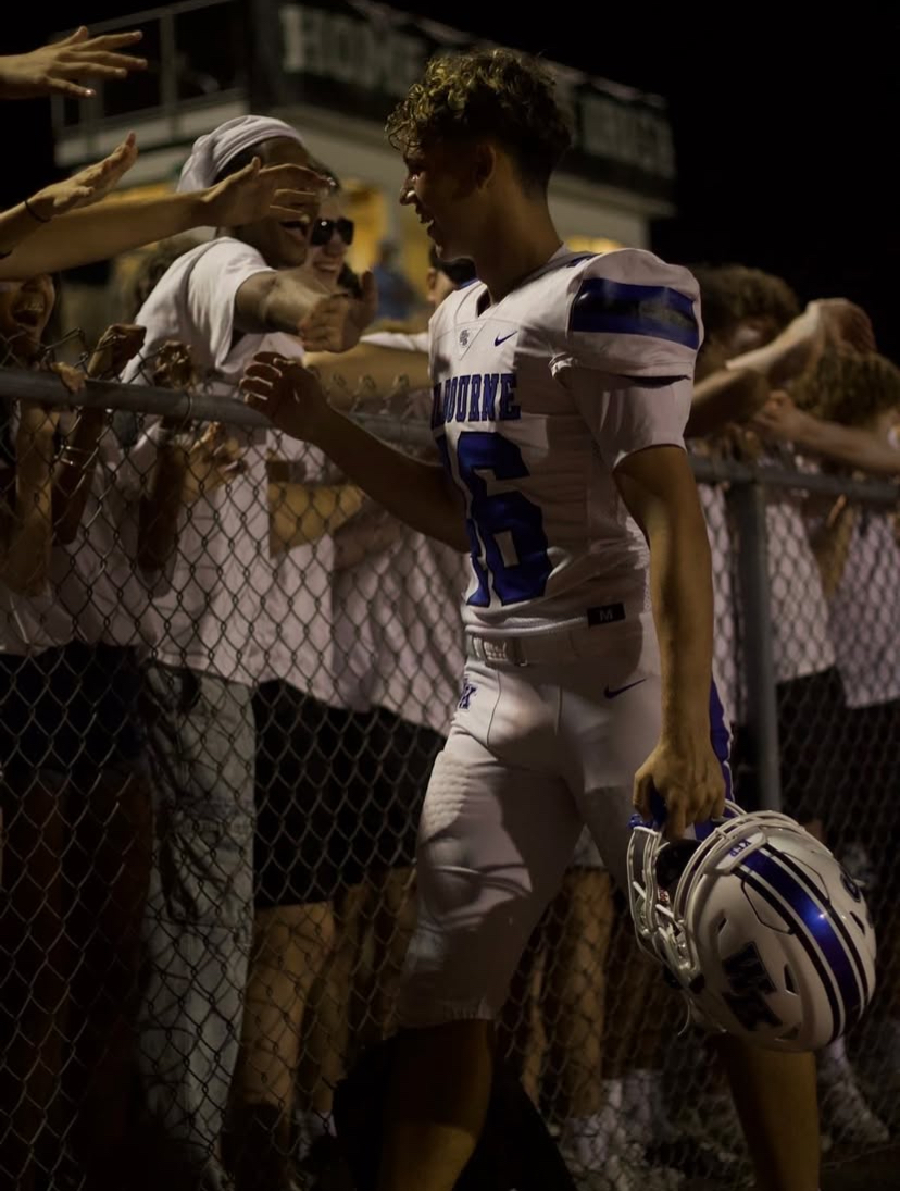 Ericyas celebrating with the student section after the Scioto game.